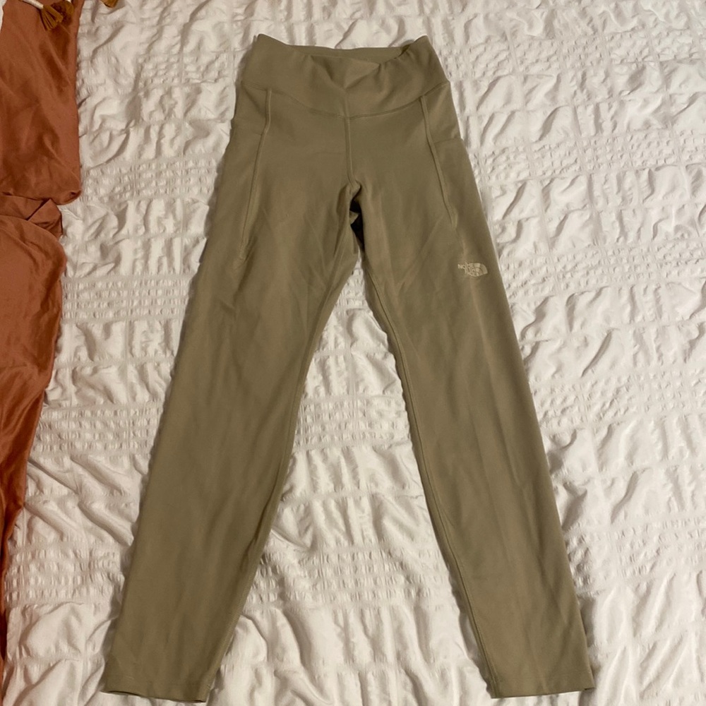 Sage green North Face leggings size small. Never before worn